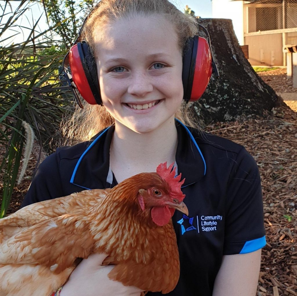 Summer and a chicken